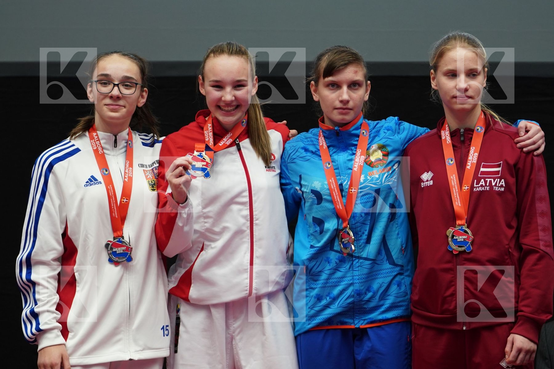 DEVIGILI HANNA (AUSTRIA), MUZIKAROVA KLARA (CZECH REPUPLIC), POPOVA ALITA (LATVIA), TREBKA DARYA (BELARUS) in Cadet Kumite Female 54+ Kg - podium