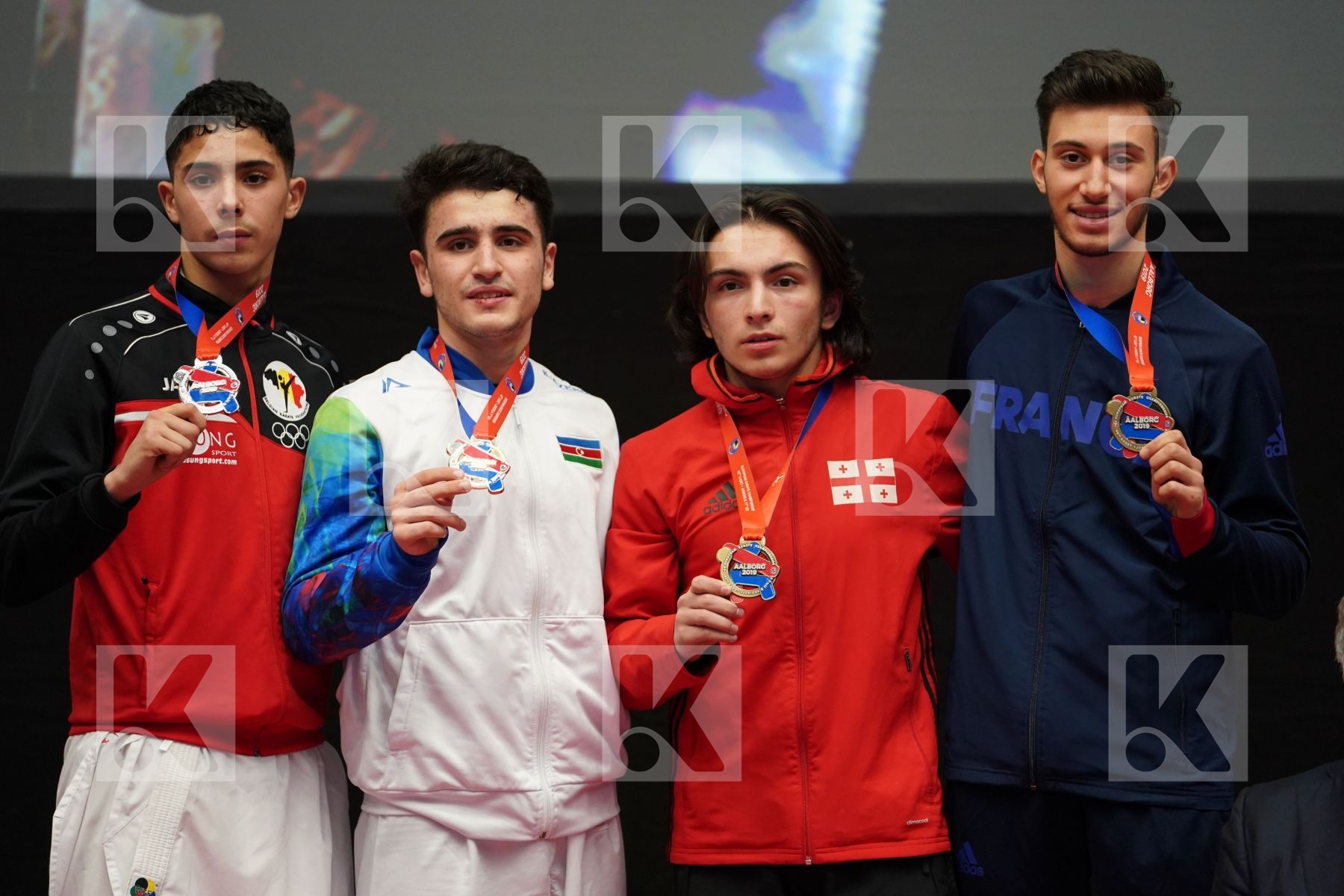GULIYEV AMINAGHA (AZERBAIJAN), OUALAD HAS AMAR YOUNESS (BELGIUM), TKVATSIRIA ALEKSANDRE (GEORGIA), EL BEQQAL BRAHIM (FRANCE) in Junior Kumite Male Ð 61 Kg - podium