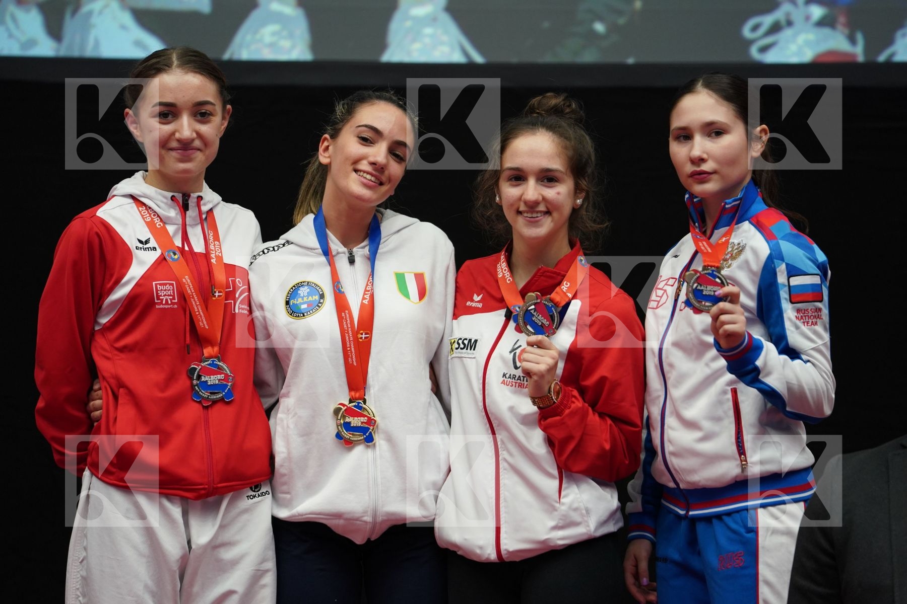 AGUS ASIA (ITALY), VOEGELIN FLORENCE (SWITZERLAND), GRUJIC ALEKSANDRA (AUSTRIA), SAMOKISHA ANGELINA (RUSSIAN FEDERATION) in Junior Kumite Female -48 Kg - podium