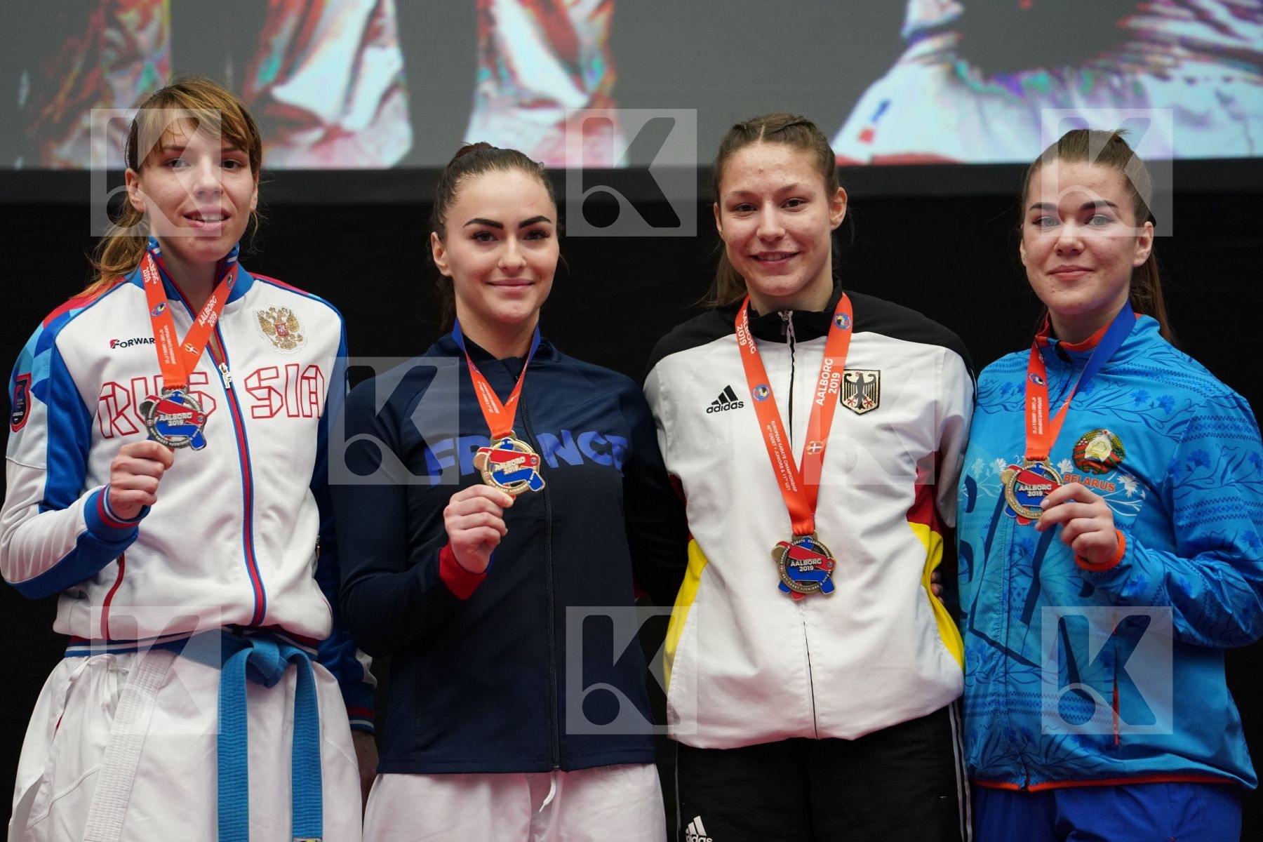 AVAZERI LEA (FRANCE), ISAEVA VICTORIA (RUSSIAN FEDERATION), SCHROETER MADELEINE (GERMANY), ALIAKSEYEVA MARYIA (BELARUS) in Under 21 Kumite Female -68 Kg - podium