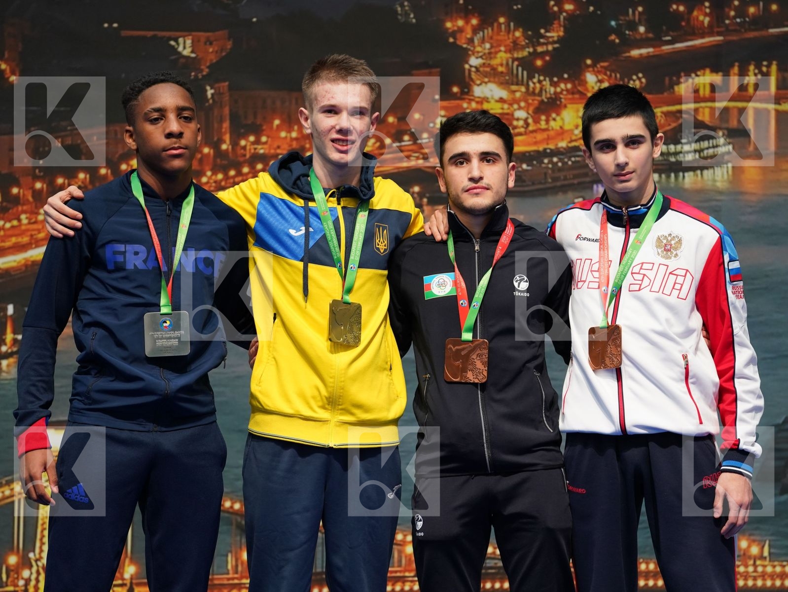 HOTSULIAK OLEKSII (UKRAINE), GARI RYAN (FRANCE), GULIYEV AMINAGHA (AZERBAIJAN), AKHMEDOV AKHMED (RUSSIAN FEDERATION) in Junior Kumite Male -61 Kg - Podium ceremony
