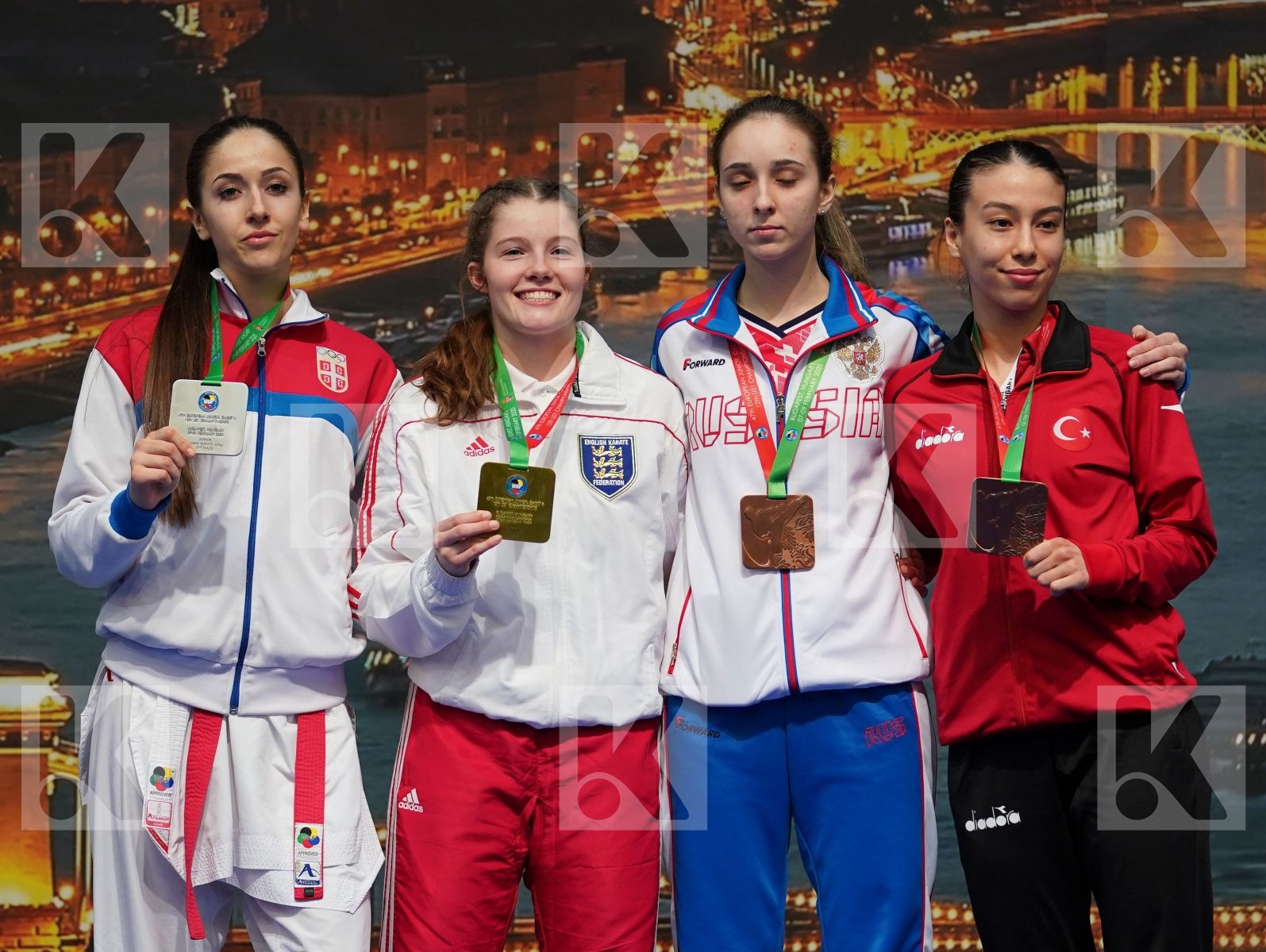 COSGROVE NIAMH LILLY (ENGLAND), NEGOVANOVIC BRANKICA (SERBIA), TOKCAN SIMAY (TURKEY), KOSTIUSHKINA ZHANNA (RUSSIAN FEDERATION) in Junior Kumite Female -53Kg - Podium ceremony