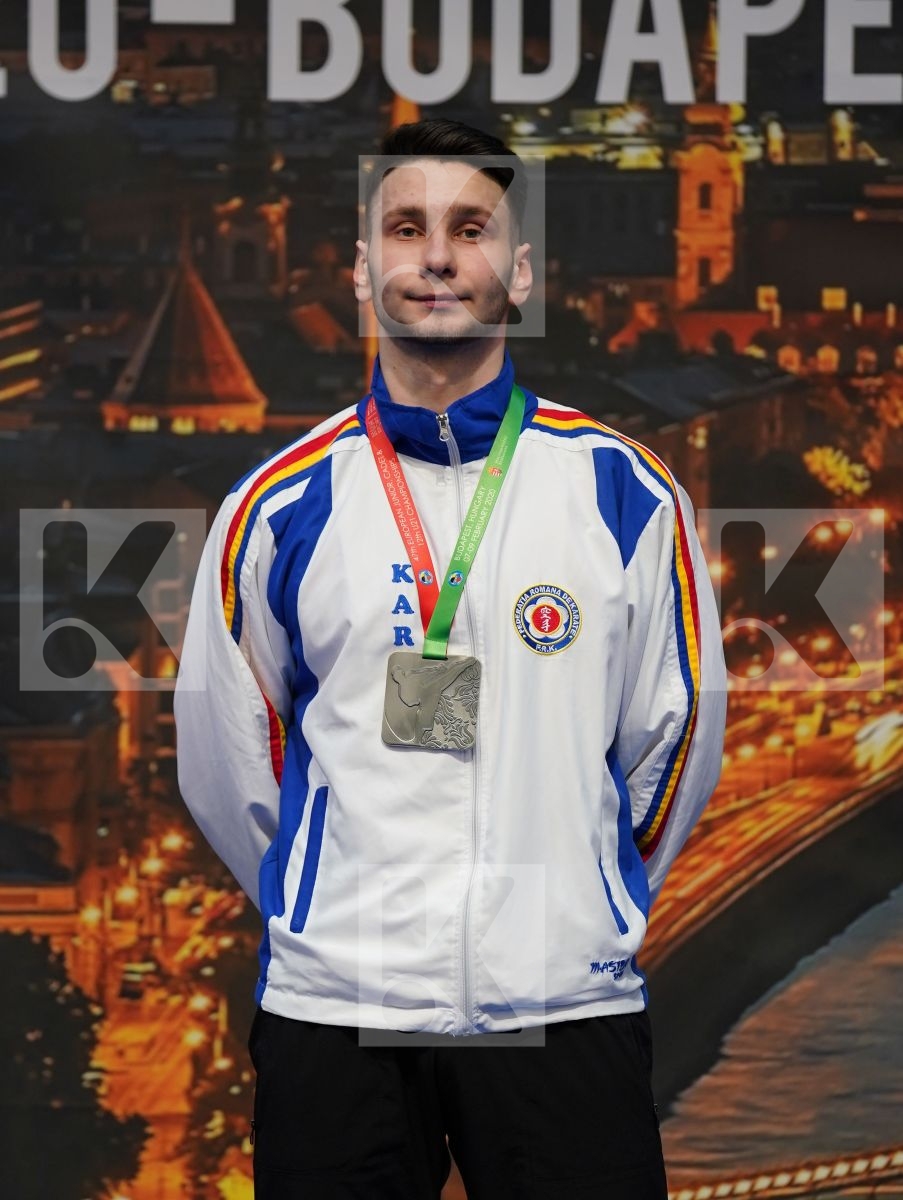 OSMANLI OSMAN (AZERBAIJAN), TANAS FLORENTIN (ROMANIA), HAIKO MIKITA (BELARUS), DVORAK ADAM (HUNGARY) in Junior Kumite Male 76+ Kg - Podium ceremony