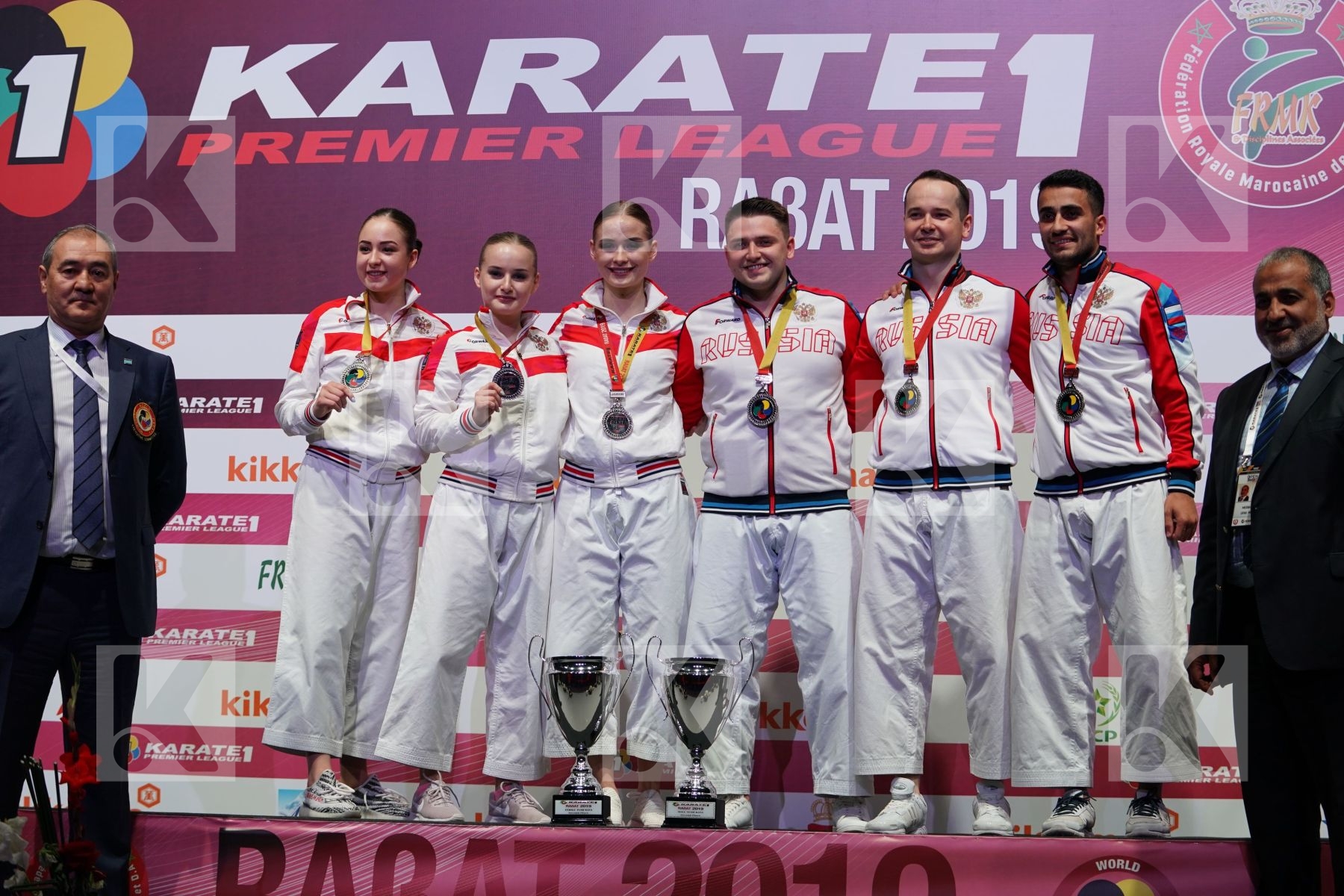 Silver kata team medalists during podium ceremony