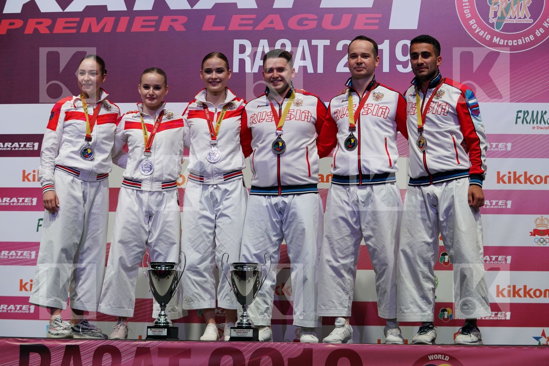 Silver kata team medalists during podium ceremony