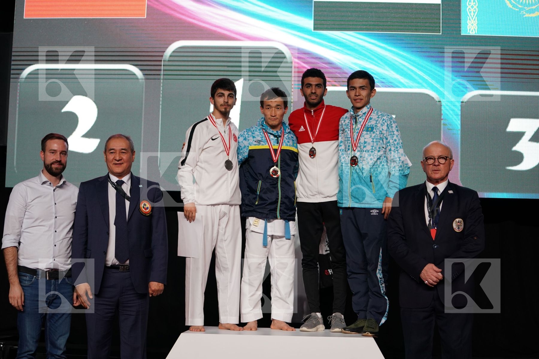 ERAY SAMDAN (TURKEY), DARKHAN ASSADILOV (KAZAKHSTAN), MALEK SALAMA (EGYPT), KAISAR ALPYSBAY (KAZAKHSTAN) in Senior Kumite -60 Kg - podium ceremony