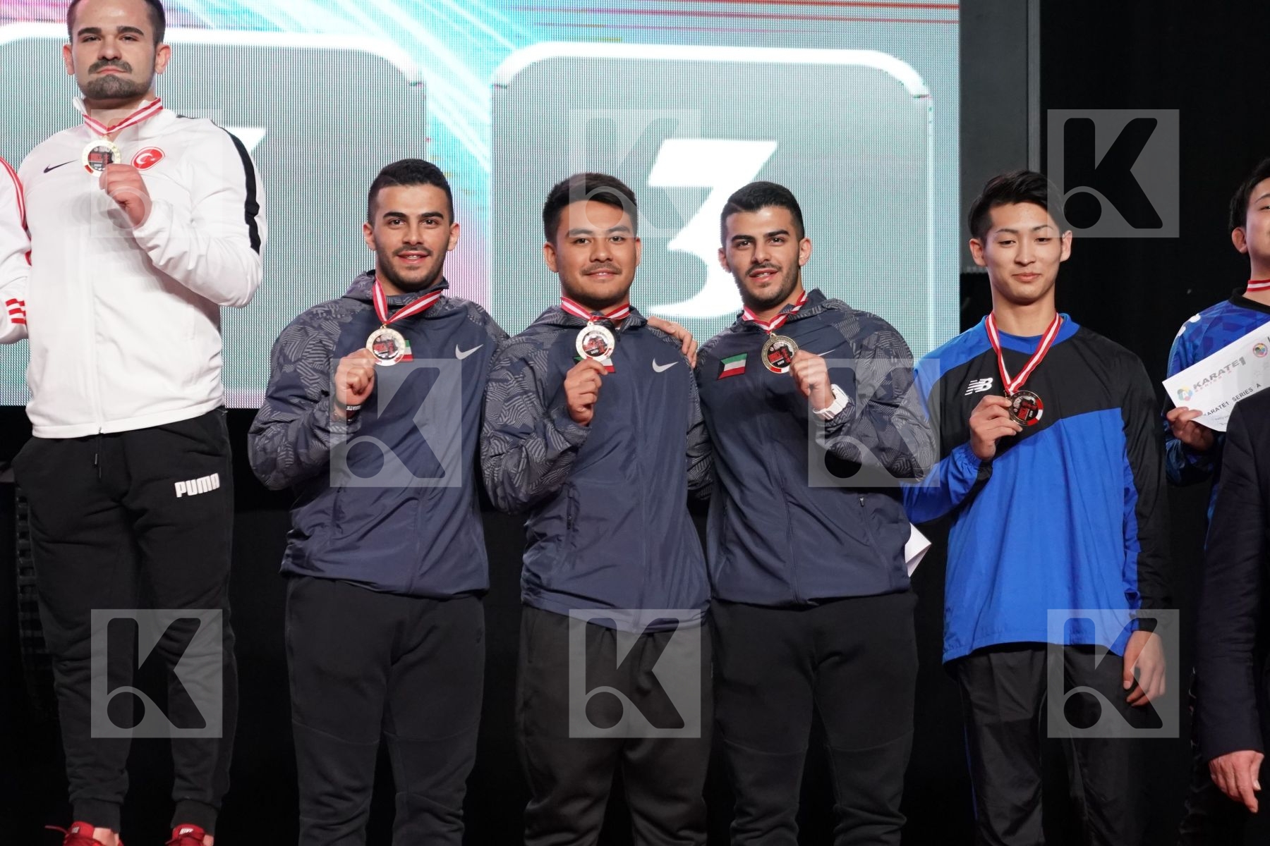 MALAYSIA (HOE, LEONG, OH THENG WEI), TURKEY (DURAN, GOKTAS, SOFUOGLU), KUWAIT (ALMOSAWI, ALMOSAWI, HUSAIN), JAPAN (MATSUDA, TSUJIMOTO, YAMADA) in Senior Team Male Kata - podium ceremony