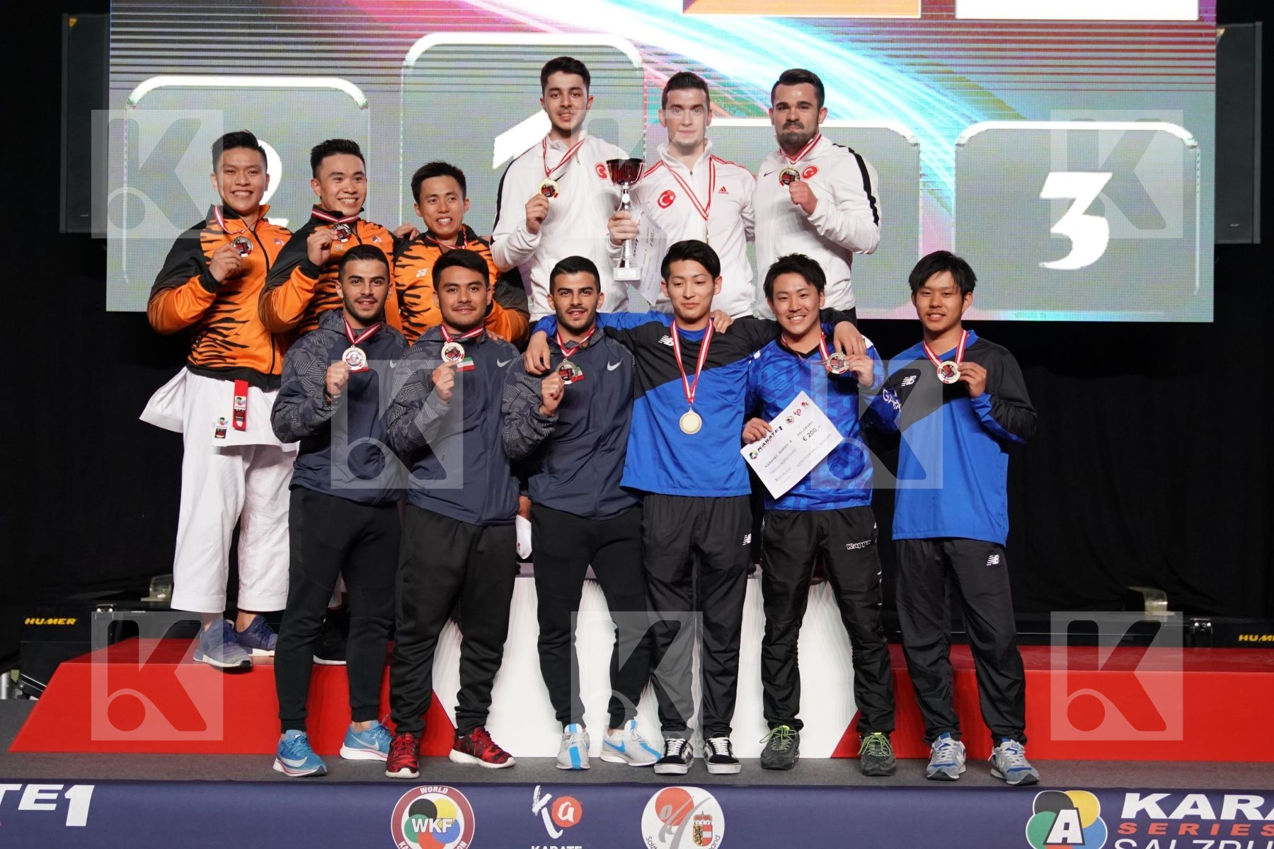 MALAYSIA (HOE, LEONG, OH THENG WEI), TURKEY (DURAN, GOKTAS, SOFUOGLU), KUWAIT (ALMOSAWI, ALMOSAWI, HUSAIN), JAPAN (MATSUDA, TSUJIMOTO, YAMADA) in Senior Team Male Kata - podium ceremony