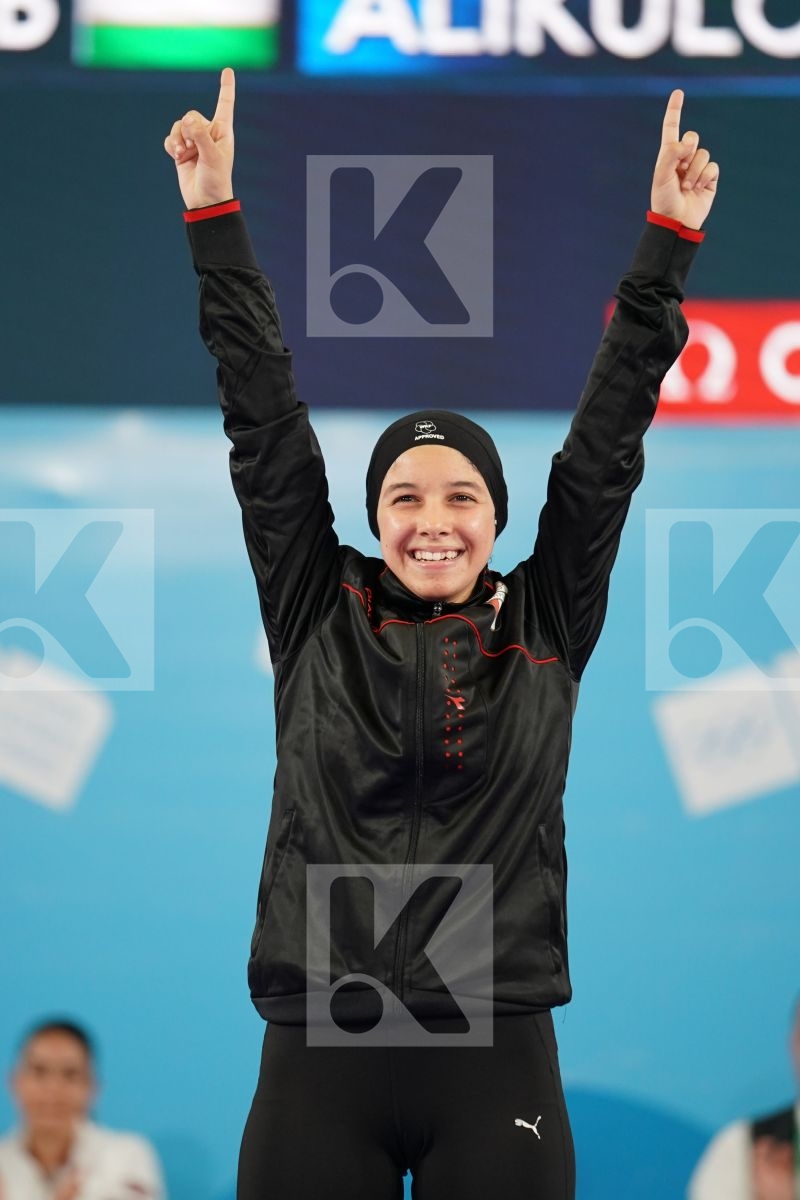 YASMIN NASR (EGYPT), RINKA TAHATA (JAPAN), FATEMEH KONAKDARTARSI (IRAN), DILDORA ALIKULOV (UZBEKISTAN) in Junior Kumite Female -53Kg - Podium ceremony