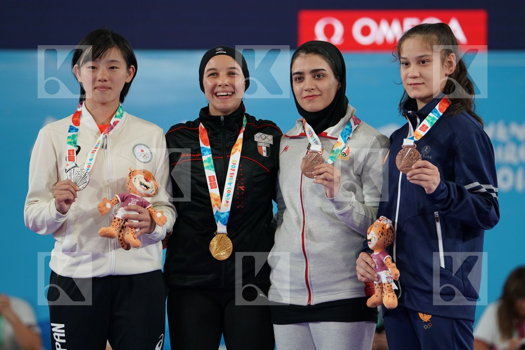 YASMIN NASR (EGYPT), RINKA TAHATA (JAPAN), FATEMEH KONAKDARTARSI (IRAN), DILDORA ALIKULOV (UZBEKISTAN) in Junior Kumite Female -53Kg - Podium ceremony