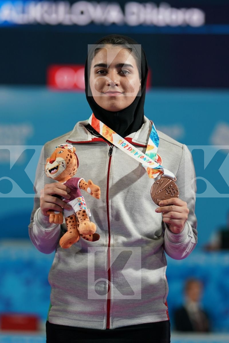 YASMIN NASR (EGYPT), RINKA TAHATA (JAPAN), FATEMEH KONAKDARTARSI (IRAN), DILDORA ALIKULOV (UZBEKISTAN) in Junior Kumite Female -53Kg - Podium ceremony