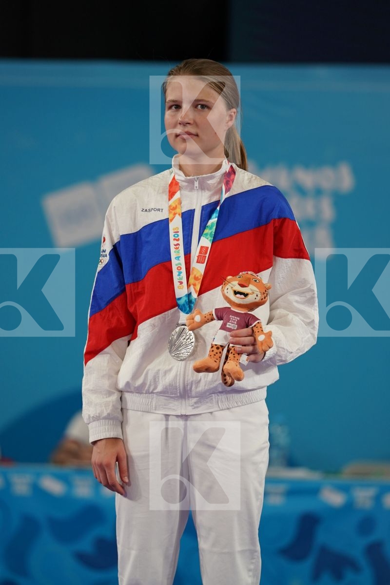 KOKORO SAKAJI (JAPAN), ANNA CHERNYSHEVA (RUSSIA), MOBINA HEYDARIOZOMECHELOE (IRAN), IVANA PEROVIC (SERBIA) in Junior Kumite Female - 59 Kg - Podium ceremony