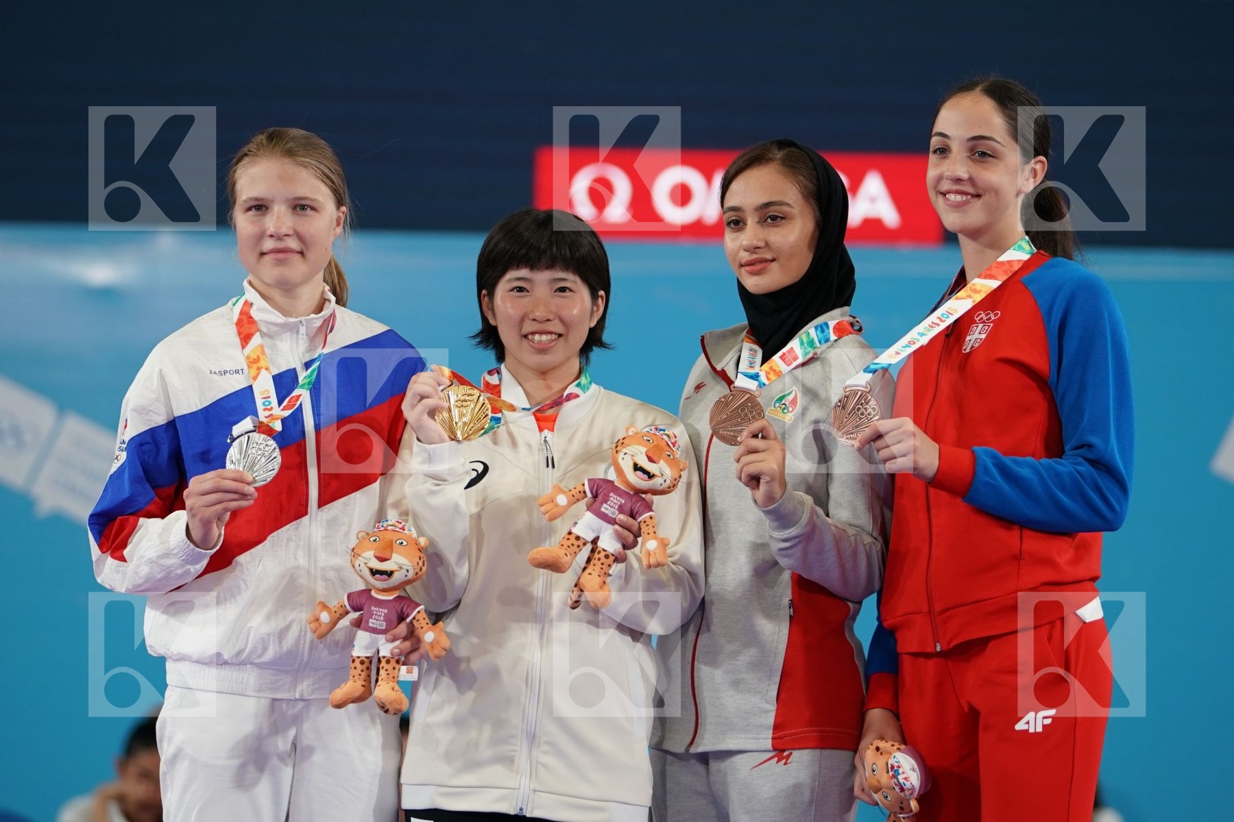 KOKORO SAKAJI (JAPAN), ANNA CHERNYSHEVA (RUSSIA), MOBINA HEYDARIOZOMECHELOE (IRAN), IVANA PEROVIC (SERBIA) in Junior Kumite Female - 59 Kg - Podium ceremony