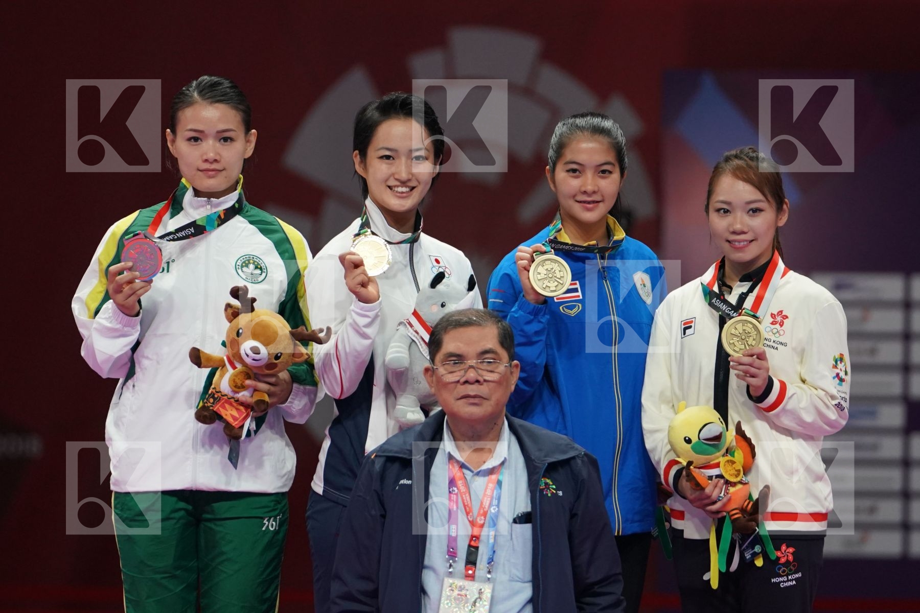 SOI LAM SOU (MACAO), KIYOU SHIMIZU (JAPAN), MONSICHA TARARATTANAKUL (THAILAND) and MO SHEUNG GRACE LAU (HONG KONG) in Senior Female Kata - podium ceremony