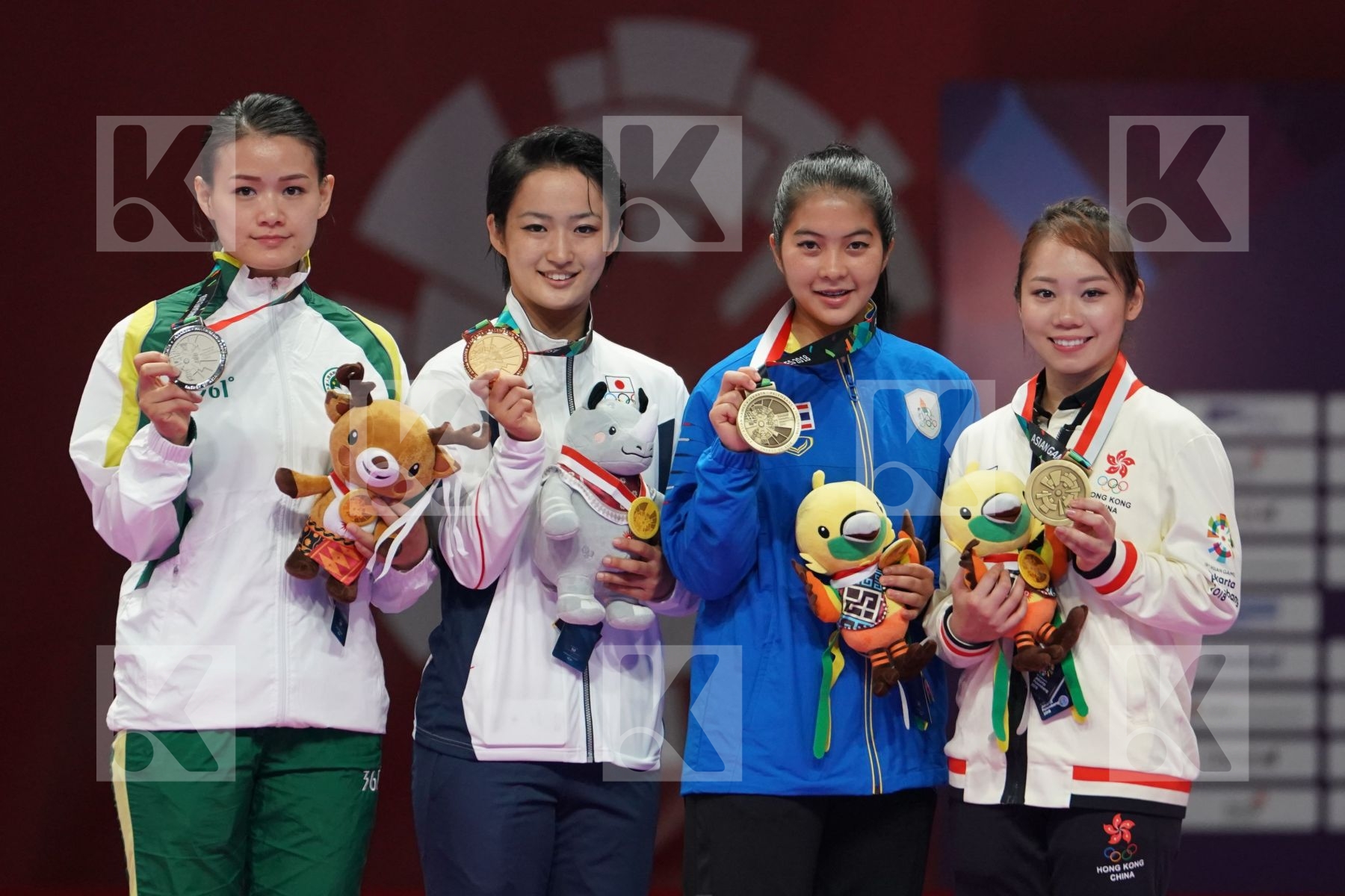 SOI LAM SOU (MACAO), KIYOU SHIMIZU (JAPAN), MONSICHA TARARATTANAKUL (THAILAND) and MO SHEUNG GRACE LAU (HONG KONG) in Senior Female Kata - podium ceremony