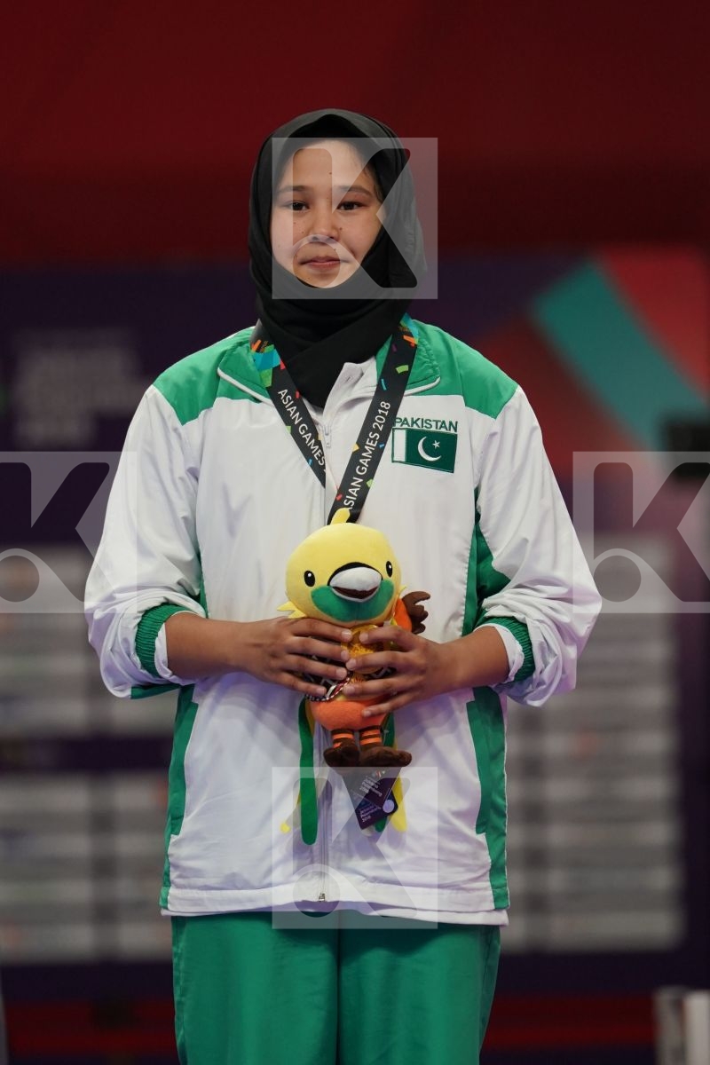 MENGMENG GAO (CHINA), AYUMI UEKUSA (JAPAN), HAMIDEH ABBASALI (ISLAMIC REPUBLIC OF IRAN), NARGIS (PAKISTAN) in Senior Kumite 68+ Kg - podium ceremony