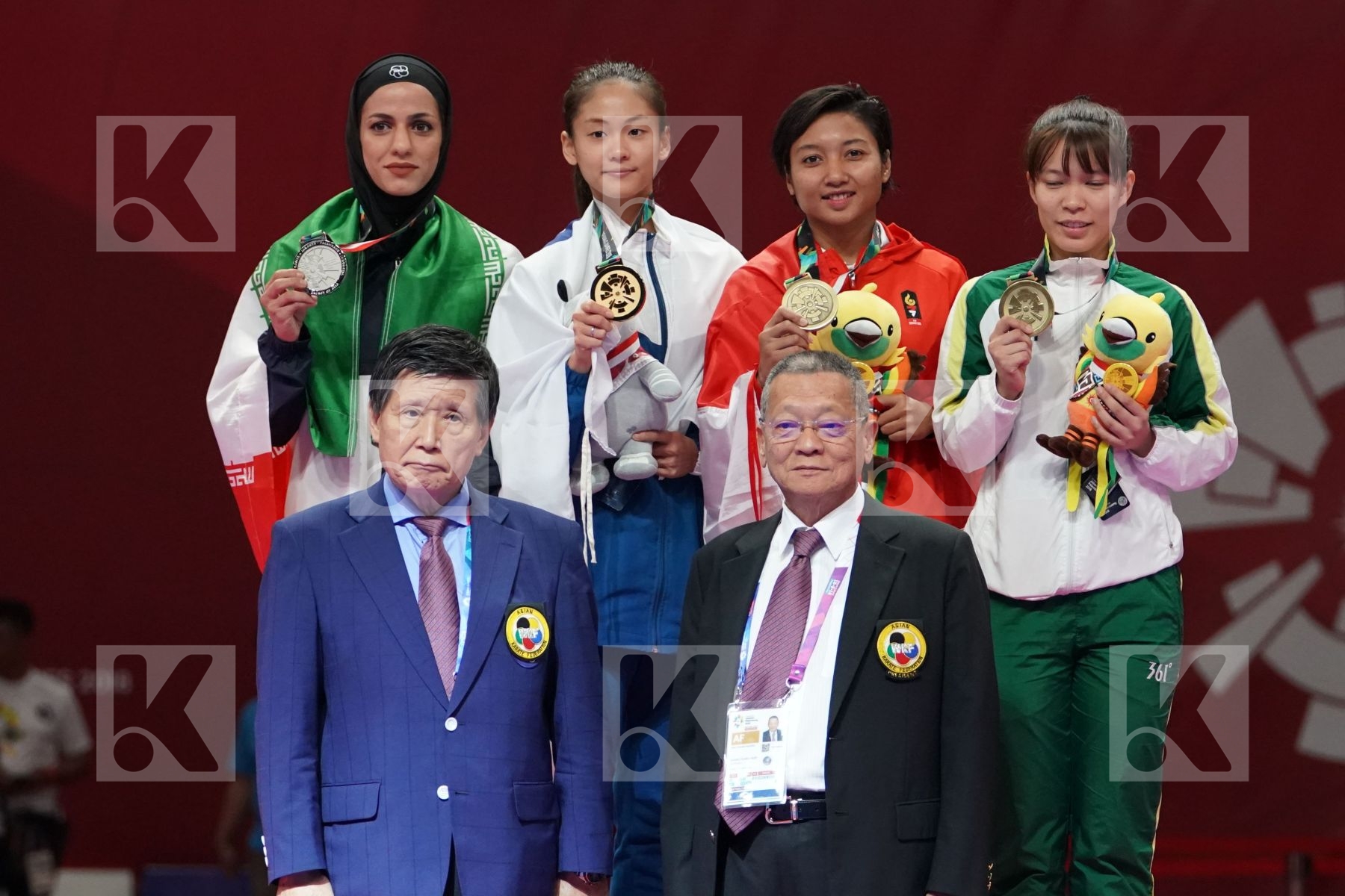 TARAVAT KHAKSAR (ISLAMIC REPUBLIC OF IRAN), TZUYUN WEN (CHINESE TAIPEI), COKORDA ISTRI AGUNG SANISTYARANI (INDONESIA), SOK I WONG (MACAO) in Senior Kumite -55 Kg - podium ceremony