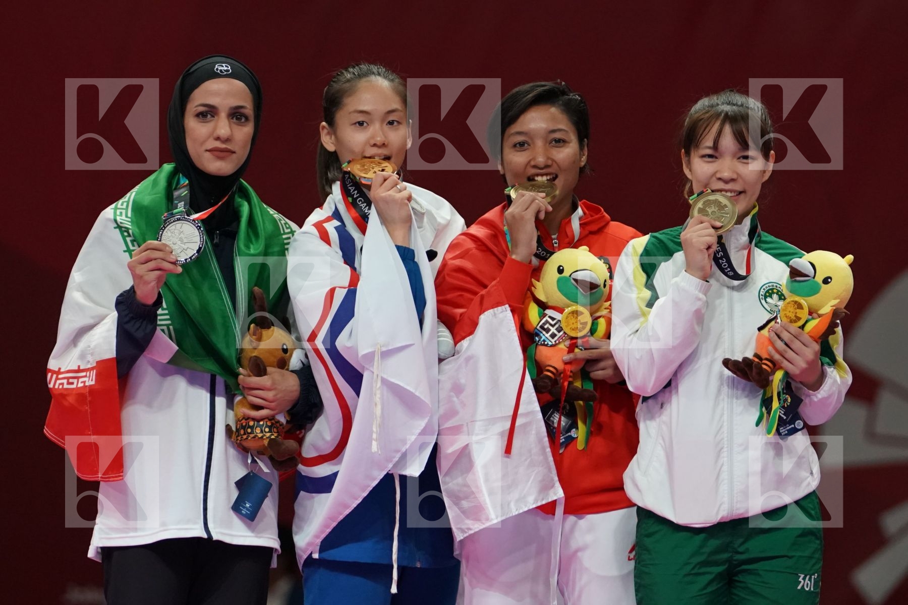 TARAVAT KHAKSAR (ISLAMIC REPUBLIC OF IRAN), TZUYUN WEN (CHINESE TAIPEI), COKORDA ISTRI AGUNG SANISTYARANI (INDONESIA), SOK I WONG (MACAO) in Senior Kumite -55 Kg - podium ceremony