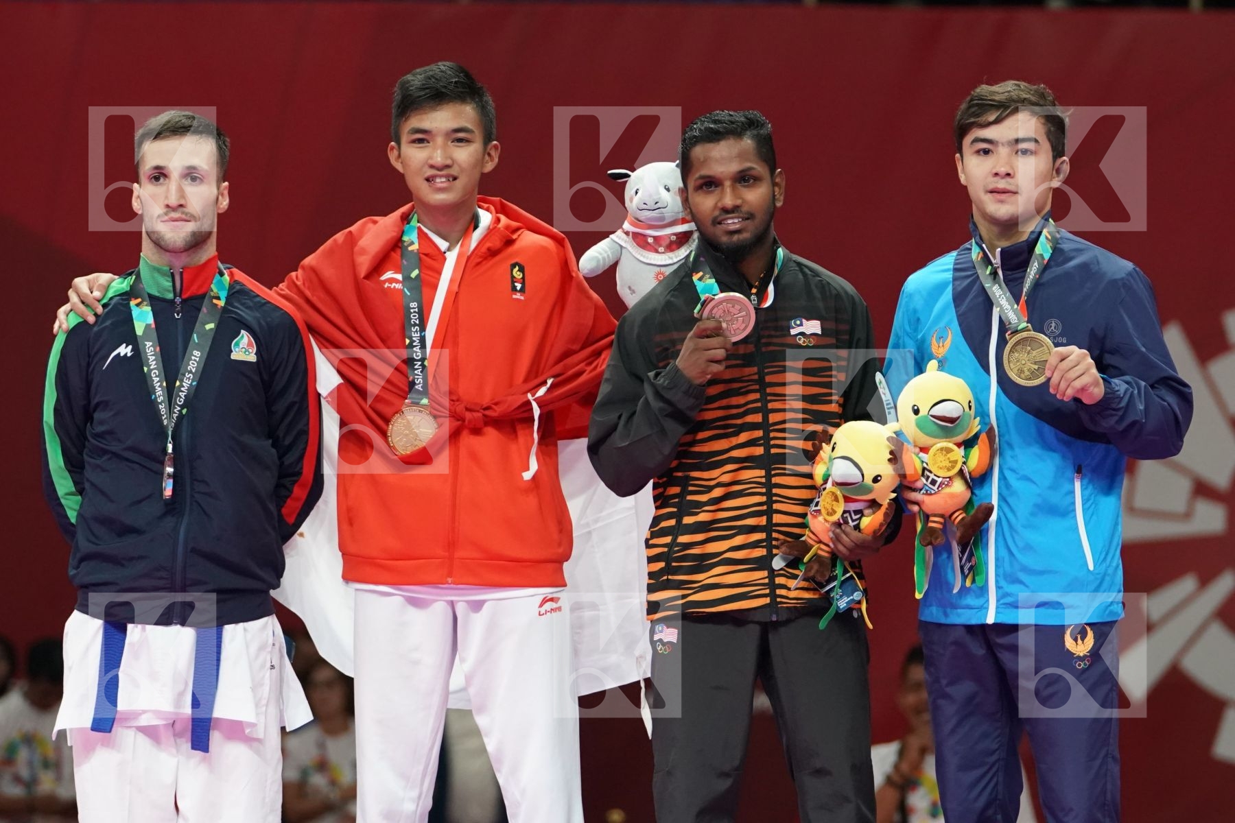AMIR MAHDI ZADEH (ISLAMIC REPUBLIC OF IRAN), RIFKI ARDIANSYAH ARROSYIID (INDONESIA), PREM KUMAR SELVAM (MALAYSIA), SADRIDDIN SAYMATOV (UZBEKISTAN) in Senior Kumite -60 Kg - podium ceremony