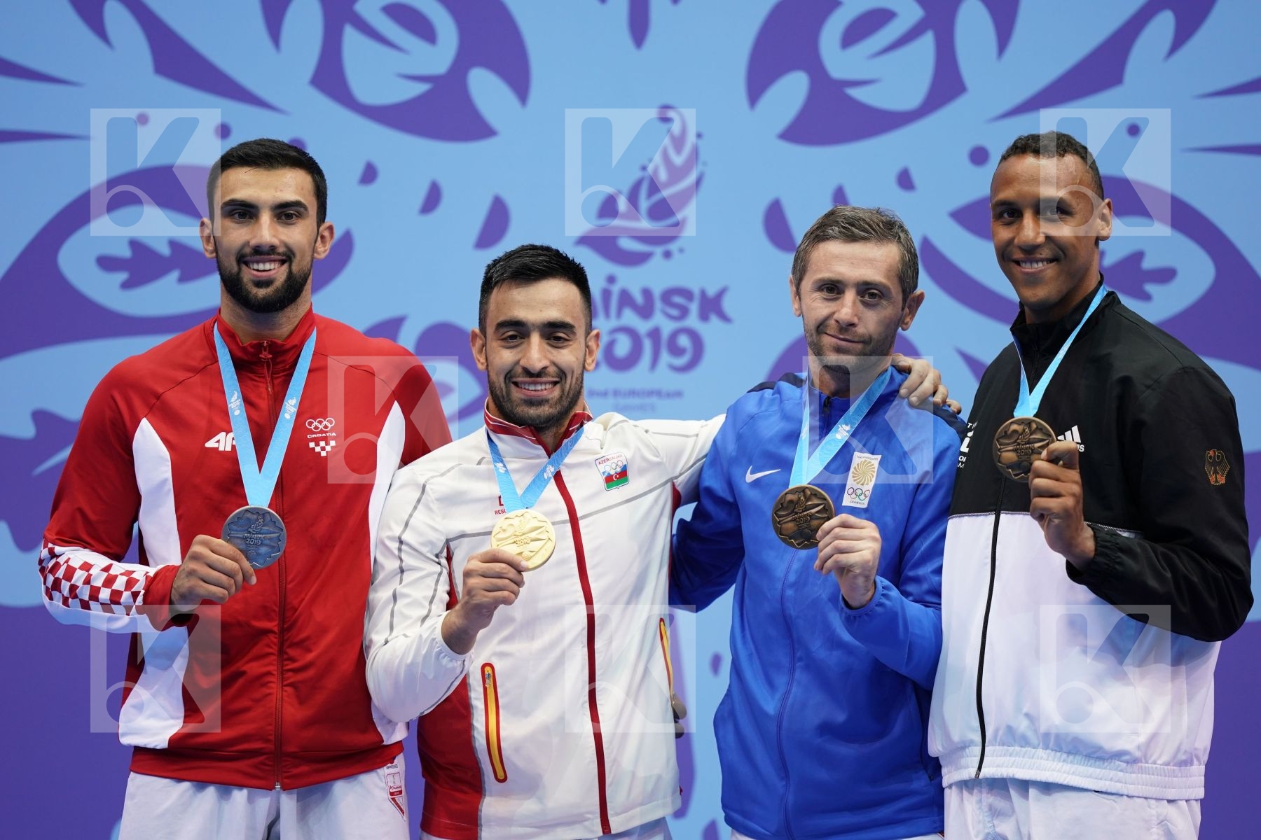 GURBANLI ASIMAN (AZERBAIJAN), KVESIC ANDJELO (CROATIA), HORNE JONATHAN (GERMANY), ARKANIA GOGITA (GEORGIA) in Senior Kumite 84+ Kg - podium ceremony