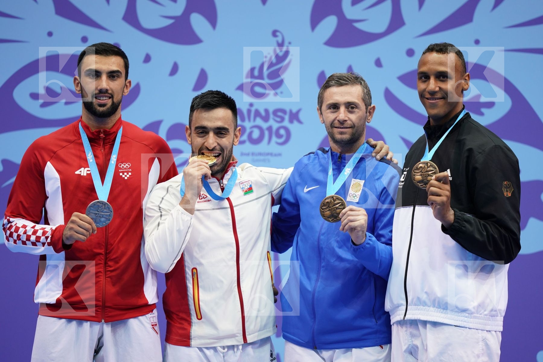 GURBANLI ASIMAN (AZERBAIJAN), KVESIC ANDJELO (CROATIA), HORNE JONATHAN (GERMANY), ARKANIA GOGITA (GEORGIA) in Senior Kumite 84+ Kg - podium ceremony