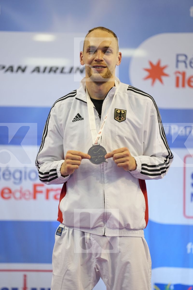 AZHIKANOV NURKANAT (KAZAKHSTAN), BITSCH NOAH (GERMANY), HARSPATAKI KAROLY GABOR (HUNGARY), ALNAJJAR BASHAR (JORDAN) in Olympic Category - Kumite Male -75 KG - Podium Ceremony