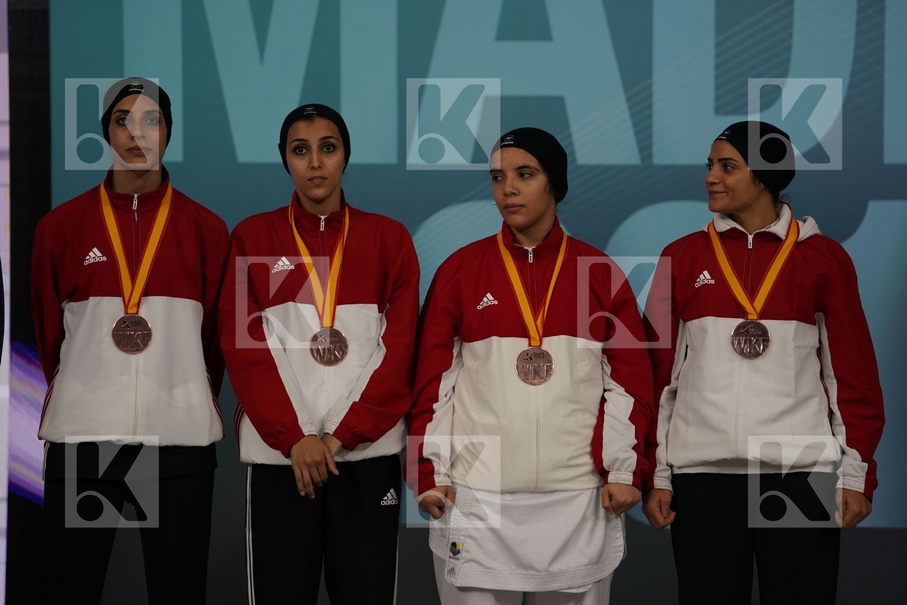 EGYPT (ABDELAZIZ, ABOUEL YAZED, AHMED, LOTFY) in Senior Team Female Kumite - Podium ceremony