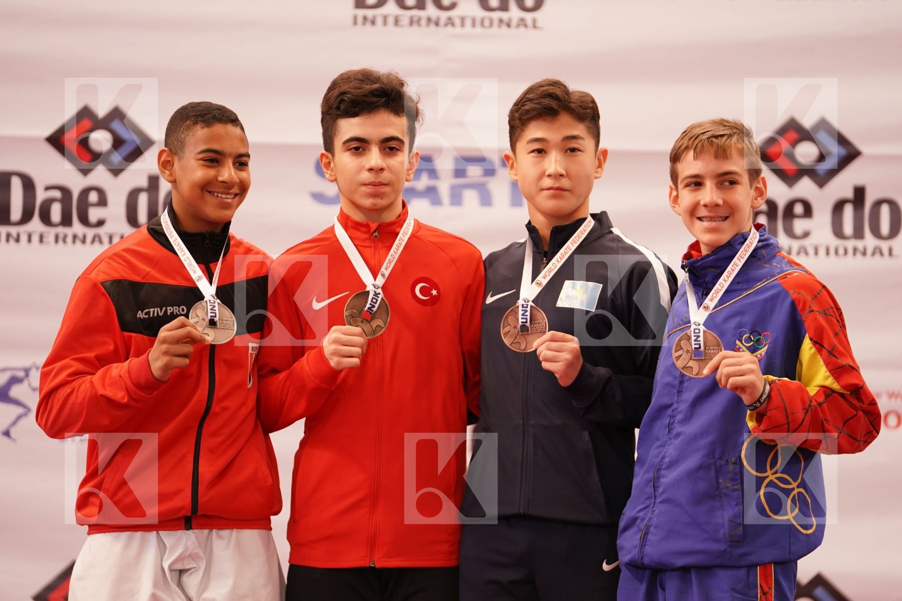 KAYNAR FURKAN (TURKEY), HUSSEIN MOHAMED HUSSEIN (EGYPT), AMANTAIULY RAUAN (KAZAKHSTAN), ZAMBRANO FERNANDO (VENEZUELA) in Cadet Kata Male - Podium ceremony