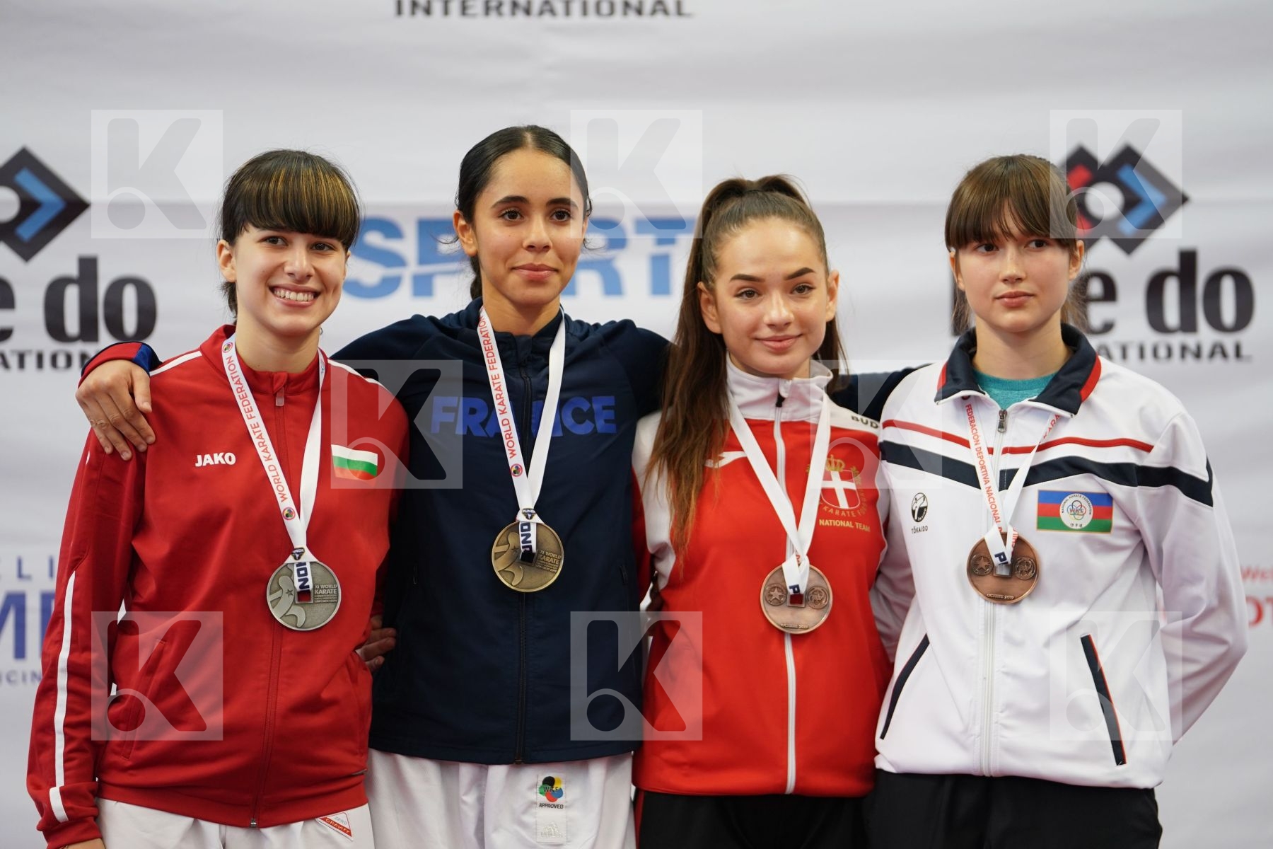 CHARIF ASSMA (FRANCE), KAMENOVA IVANA (BULGARIA), BATAKUJEVIC ERIKA (DENMARK), GURENKO POLINA (AZERBAIJAN) in Junior Kumite Female -53Kg - Podium ceremony