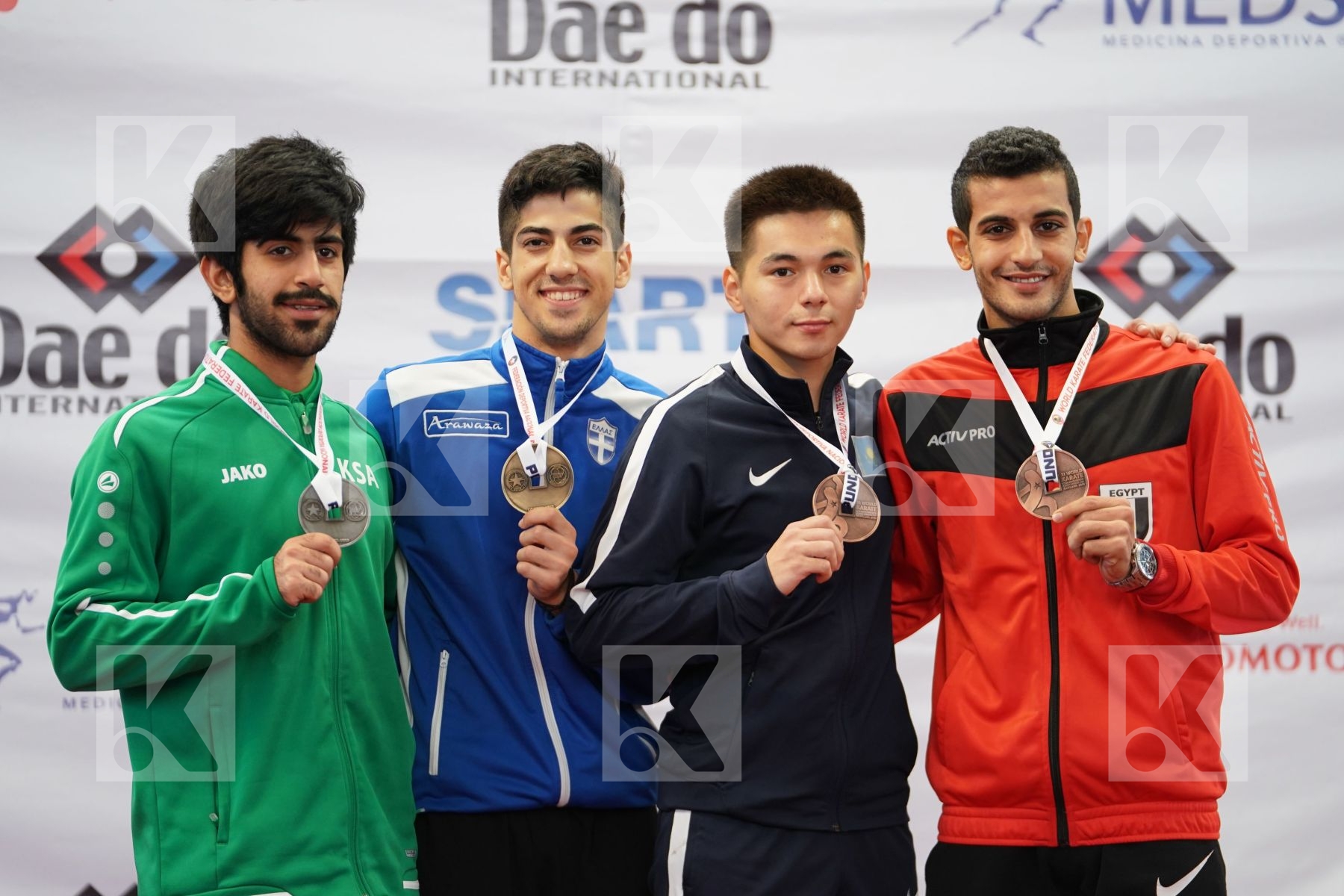 XENOS CHRISTOS-STEFANOS (GREECE), ALZUABI MESHARI (SAUDI ARABIA), BAITUREYEV YERKINBEK (KAZAKHSTAN), MOHAMED MOAMEN (EGYPT) in Under 21 Kumite Male -60 Kg - Podium ceremony