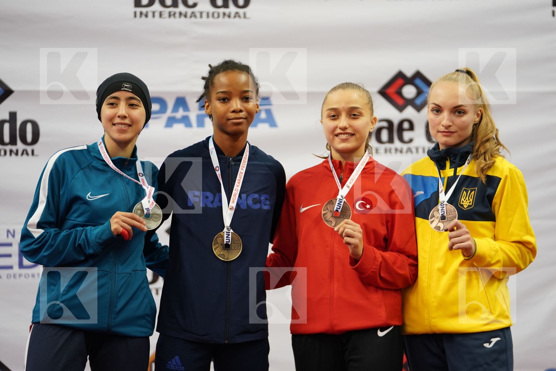 AHMED NISWA (FRANCE), ELHAYTI CHAIMAE (MOROCCO), PALASHEVSKA YULIIA (UKRAINE), ELIK RABIA (TURKEY) in Under 21 Kumite Female -50 Kg - Podium ceremony